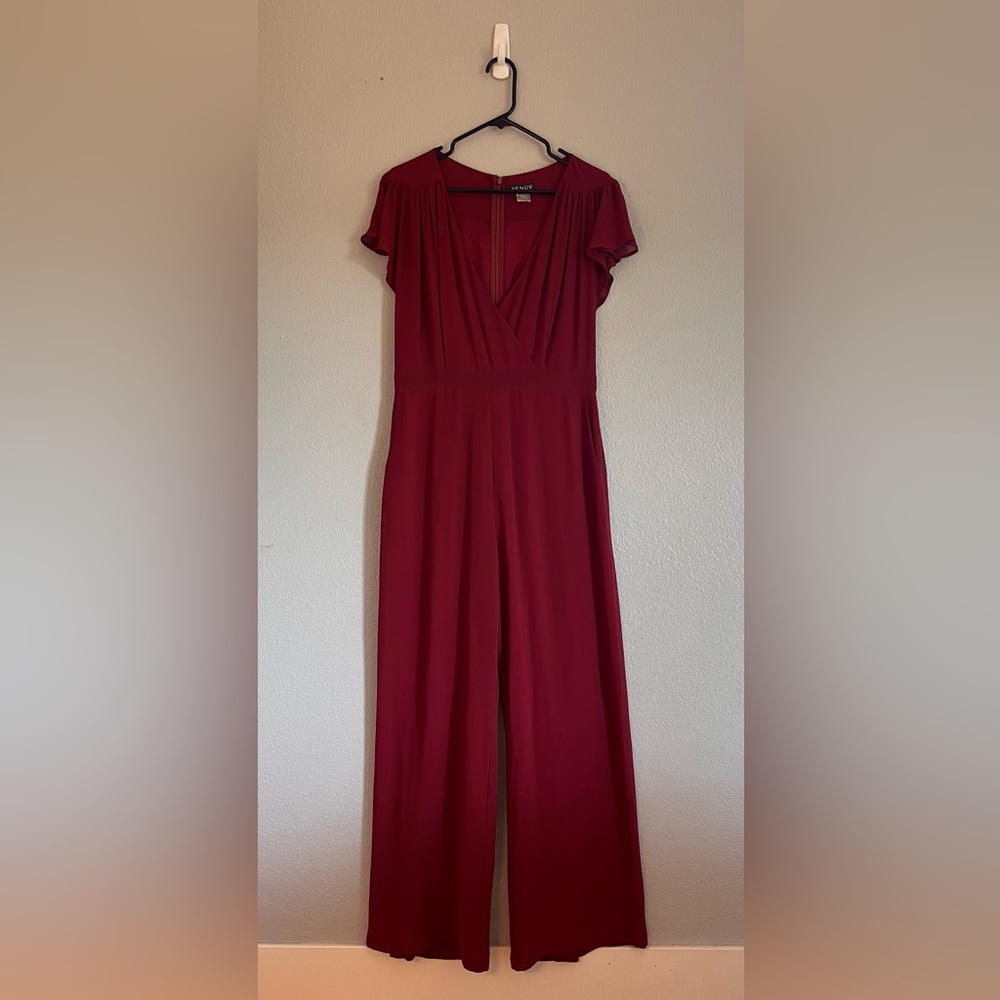 Venus cranberry red wide leg jumpsuit with flutter sleeves.